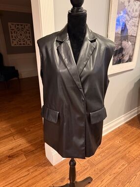 Native Youth black faux leather vest.